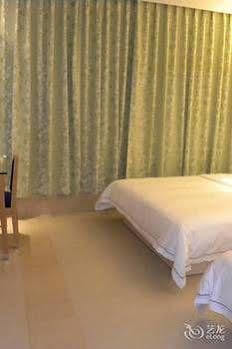 The Seven Hotel Yichang Extérieur photo